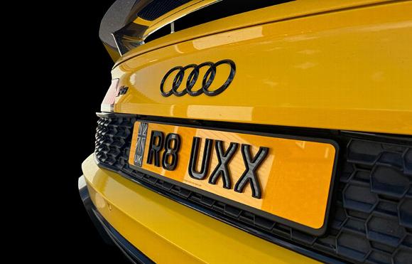 custom number plates on yellow car